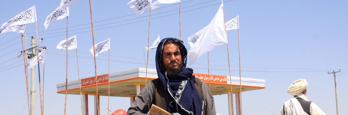 2021-08-15t045757z_1_lynxmpeh7e020_rtroptp_4_afghanistan-conflict-scaled