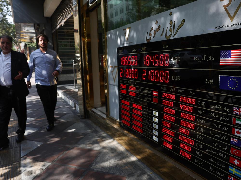 A display shows currency exchange information, in the Grand Bazaar in Tehran, Iran, August 17, 2026.