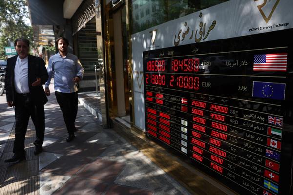 A display shows currency exchange information, in the Grand Bazaar in Tehran, Iran, August 17, 2026.