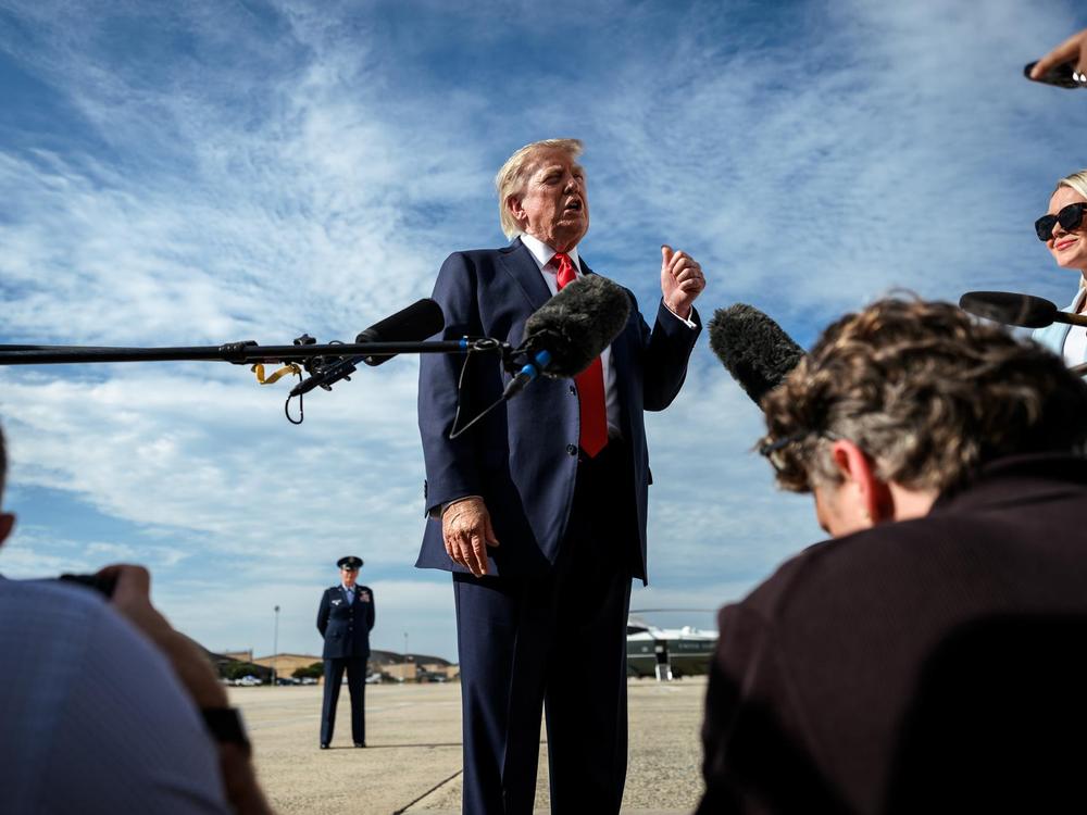 Donald Trump with reporters