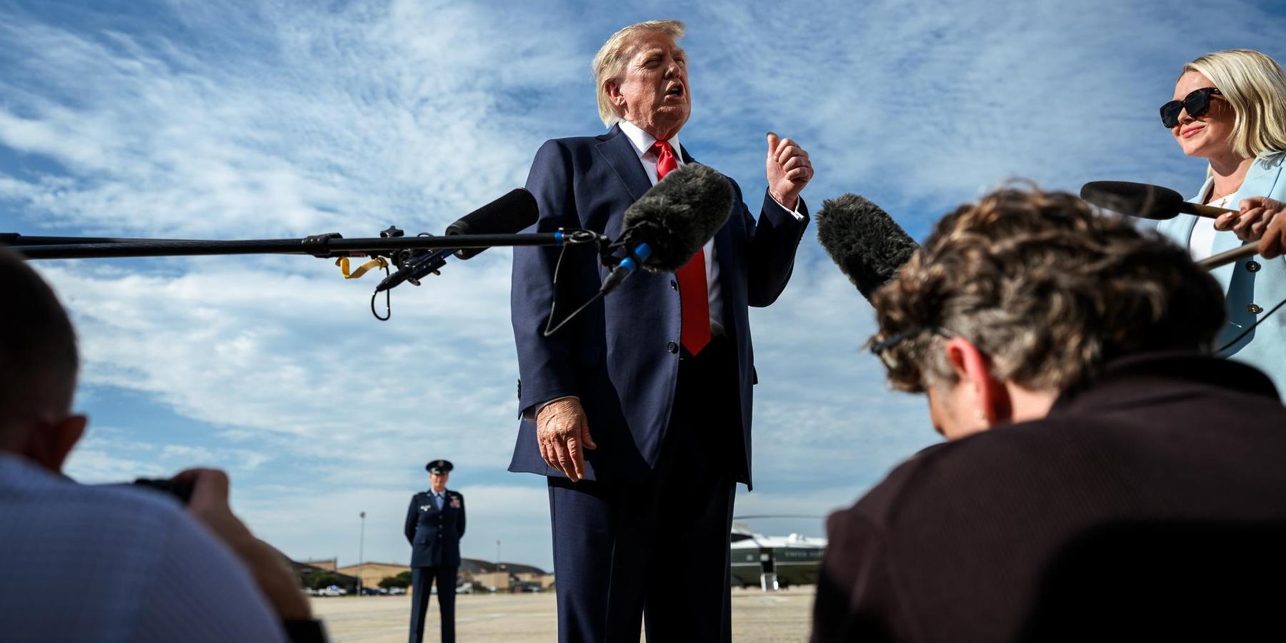 Donald Trump with reporters