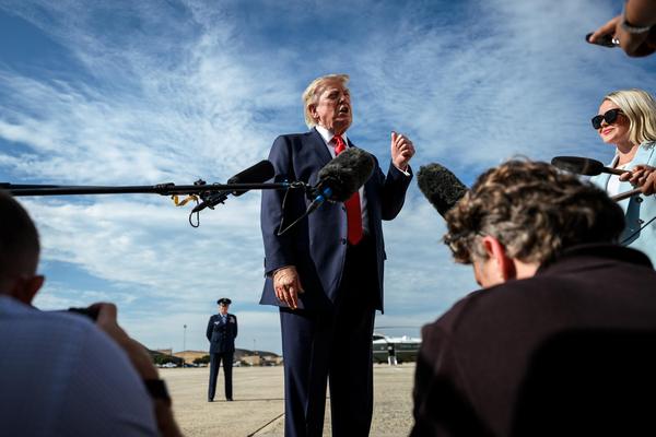 Donald Trump with reporters