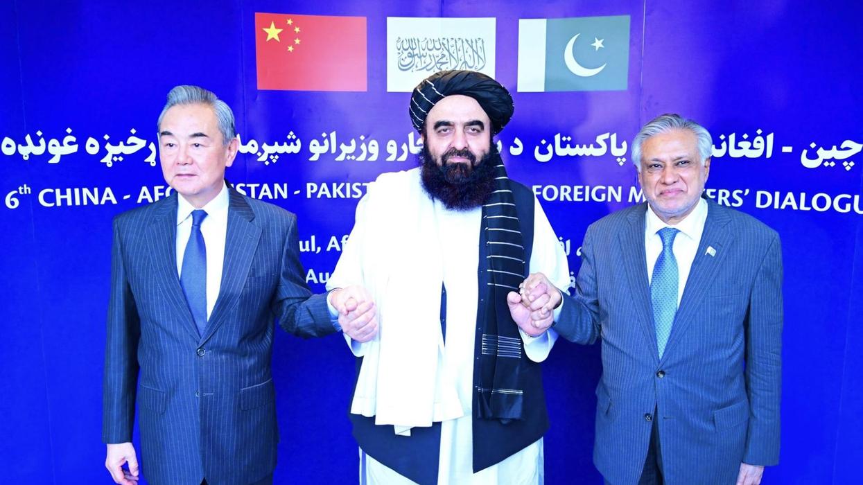 Foreign Minister of China Wang Yi, Acting Foreign Minister of Afghanistan Amir Khan Muttaqi, and Deputy Prime Minister and Foreign Minister of Pakistan Mohammad Ishaq Dar