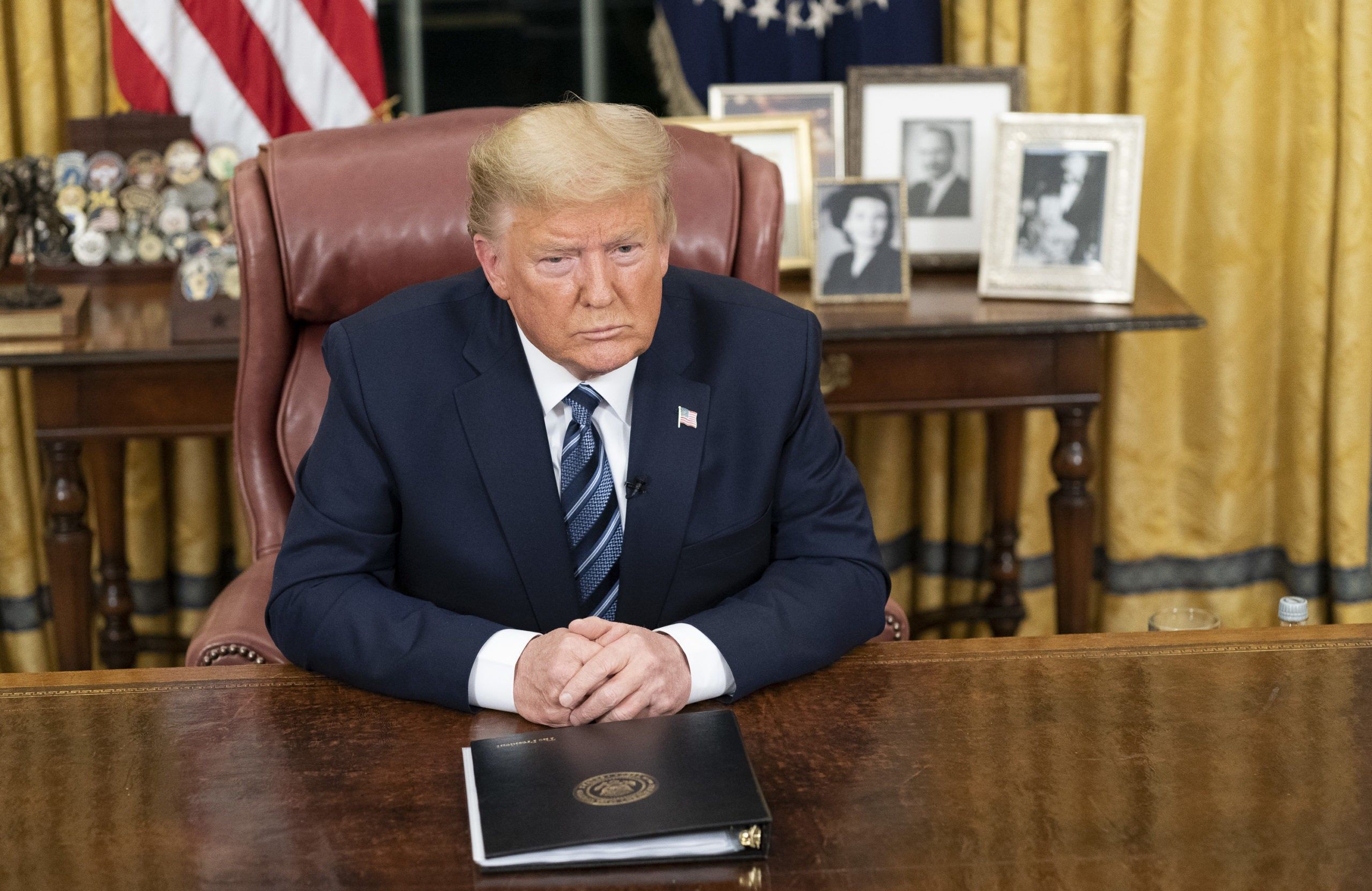 ‘Locked and loaded’: Trump threatens to attack Iran