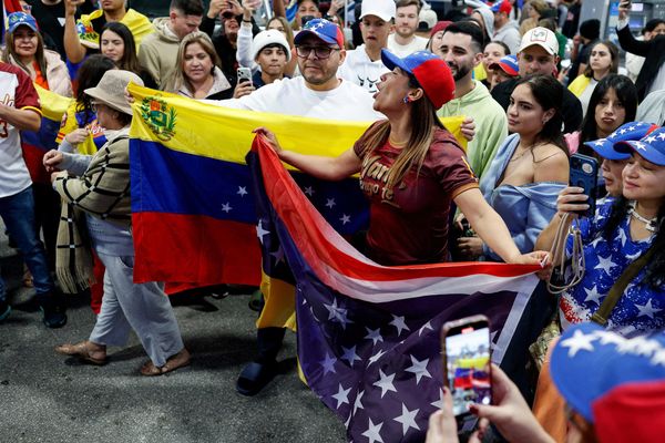 Regime change faithful toss roses at Trump after Maduro overthrow