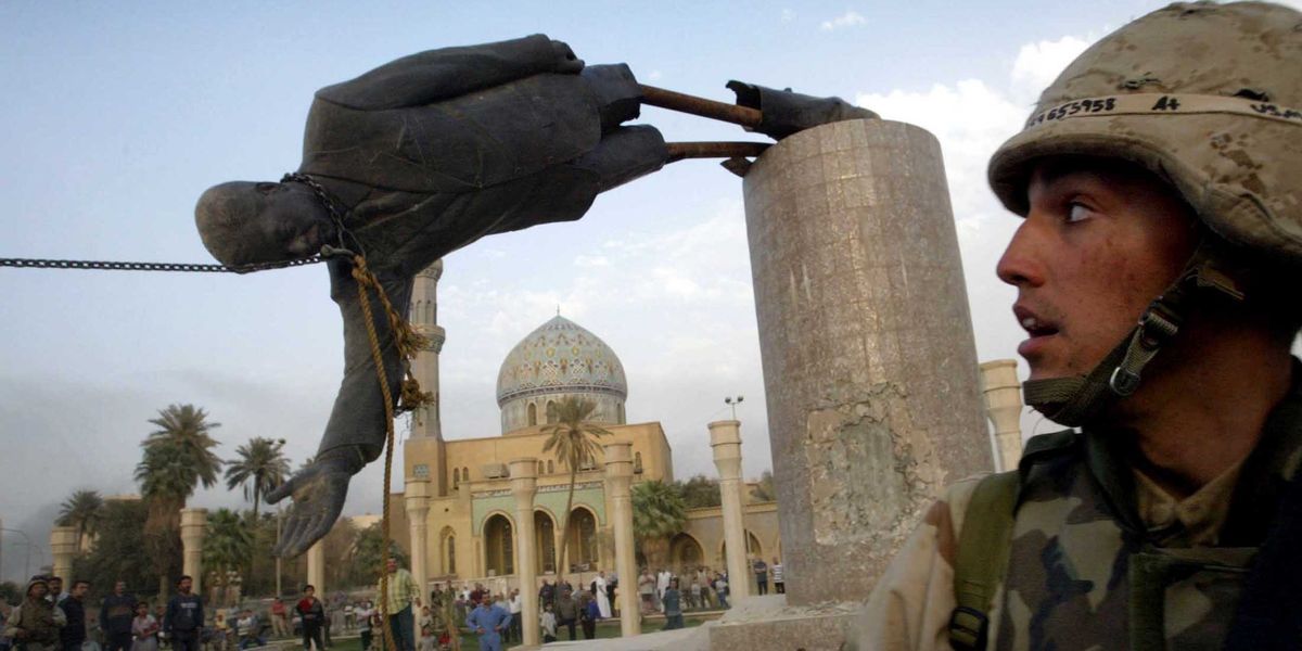 Iraq war saddam hussein statue baghdad