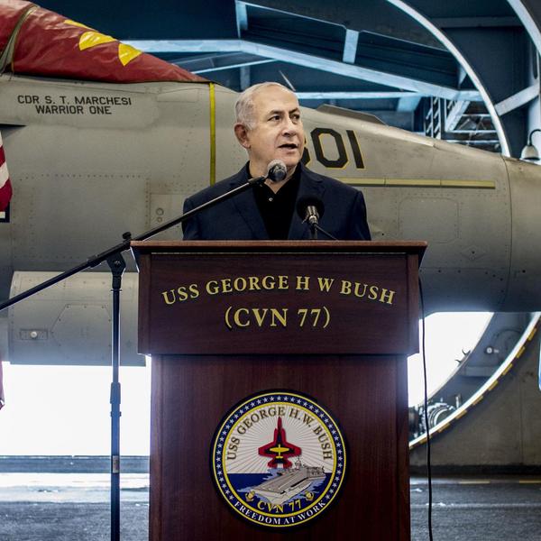Israeli Prime Minister Benjamin Netanyahu speaks during a visit to an American aircraft carrier