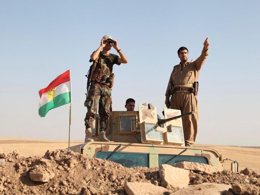 Kurdish peshmerga troops participate in an intensive security deployment