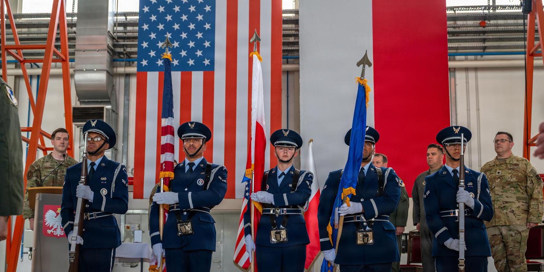 Members of the Ramstein Air Base honor guard post the colors during the 52d Operations Group Detachment 1 change of command ceremony at the 32d Tactical Air Base