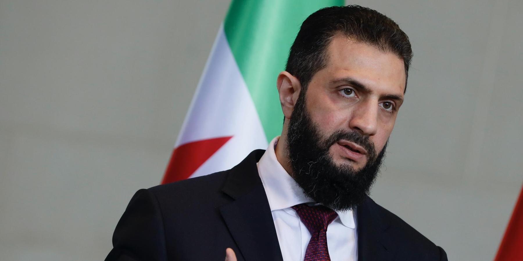Syrian interim president, Ahmed al-Sharaa, speaks after a meeting with the German chancellor at the Federal Chancellery in Berlin, German