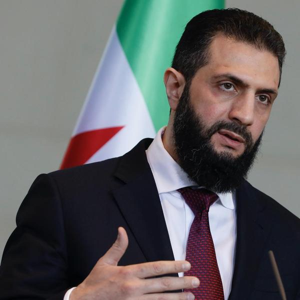 Syrian interim president, Ahmed al-Sharaa, speaks after a meeting with the German chancellor at the Federal Chancellery in Berlin, German