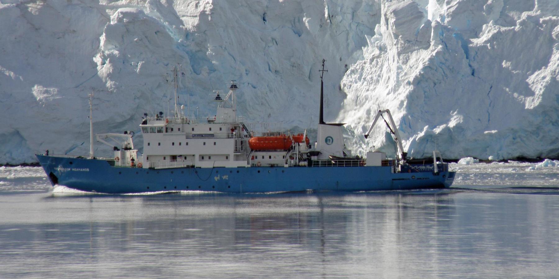 The Professor Molchanov sails in front of an ice sheet near Neko Harbor in Antarctica