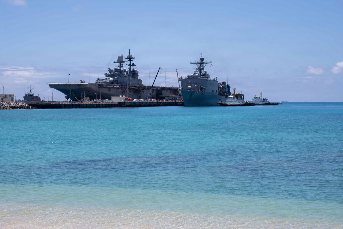 Two Navy ships arrive at port in Okinawa, Japan, after service in Asia and the Middle East