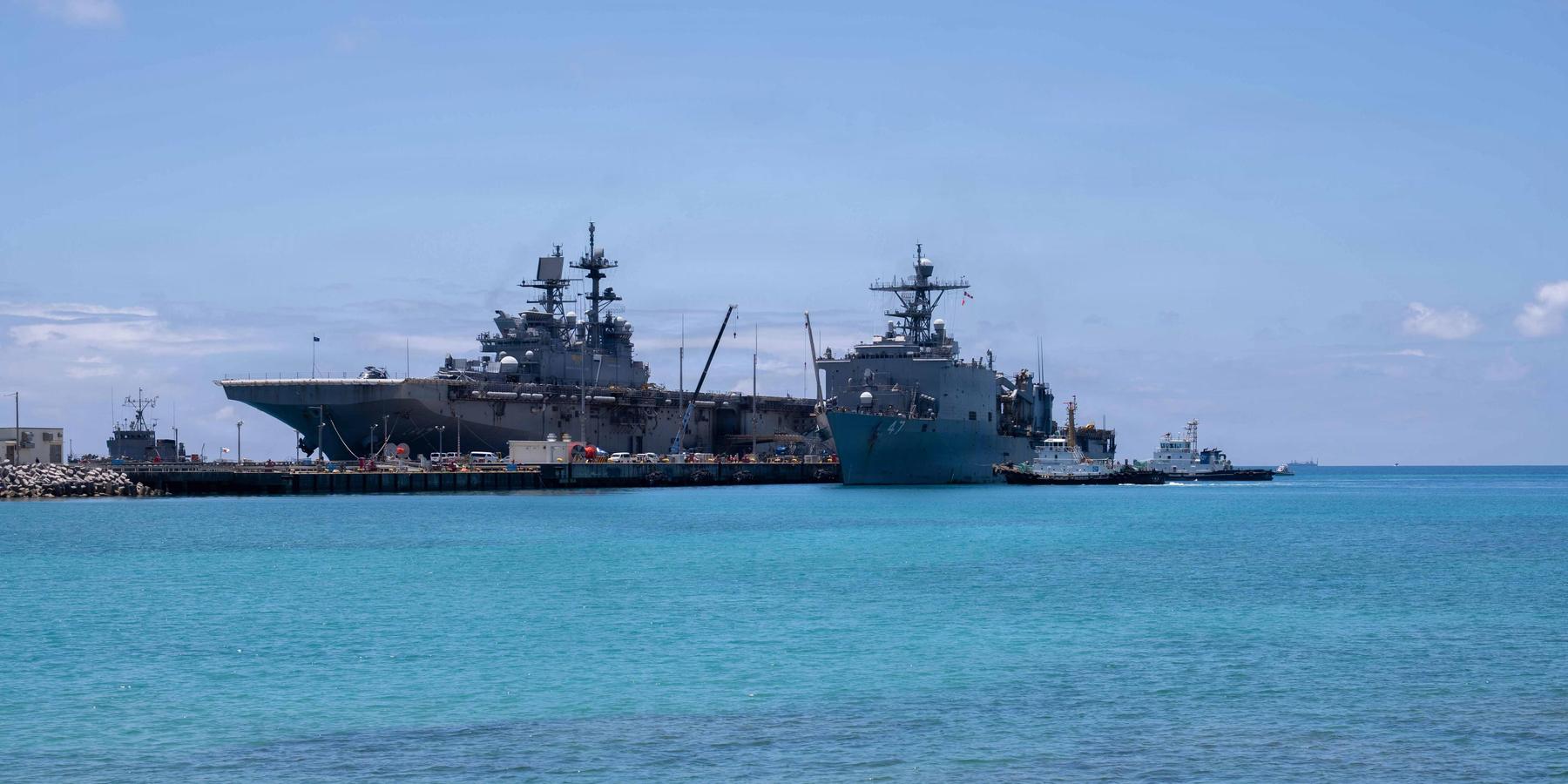 Two Navy ships arrive at port in Okinawa, Japan, after service in Asia and the Middle East