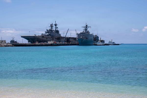 Two Navy ships arrive at port in Okinawa, Japan, after service in Asia and the Middle East