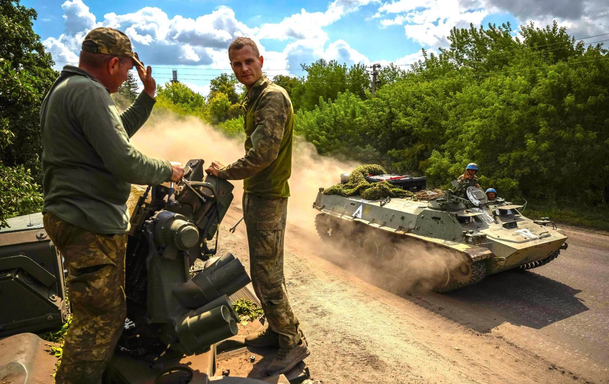 Ukrainian service members ride an Armoured Personnel Carrier, amid Russia's attack on Ukraine, near the Russian border in Sumy region, Ukraine August 11, 2024.