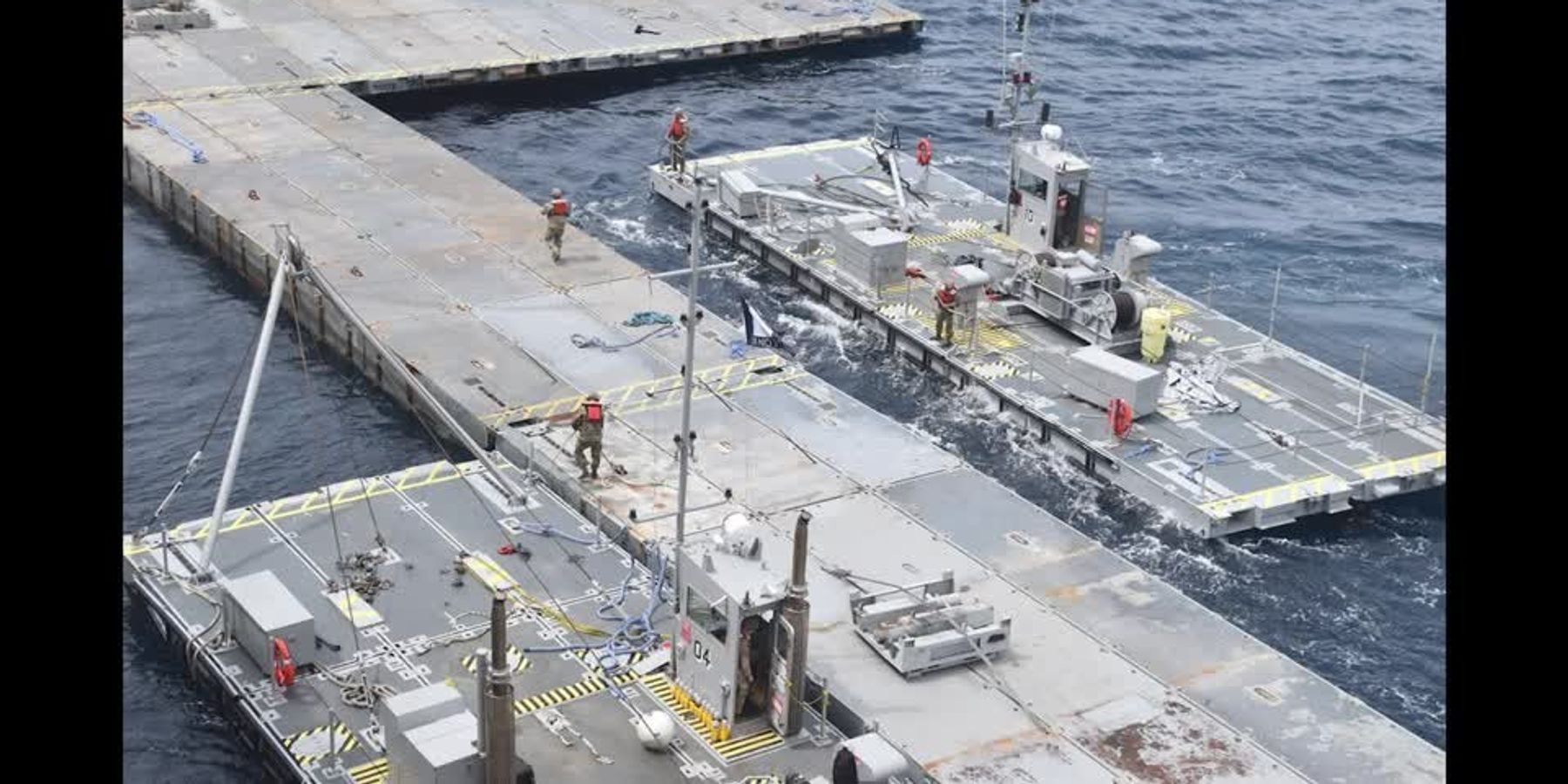 $320M US military pier to open for business, but storms ahead