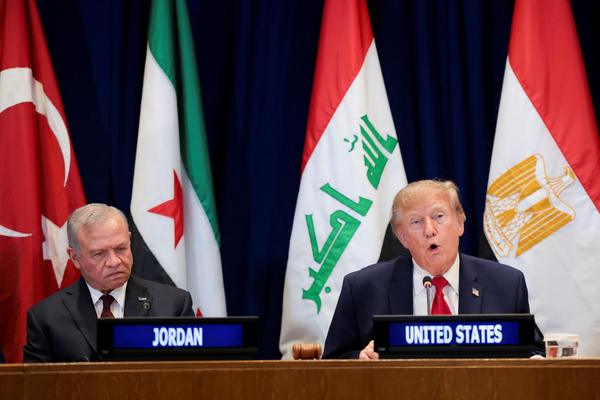 US President Donald Trump speaks next to Jordan's King Abdullah II during a multilateral meeting with leaders from the Gulf Cooperation Council