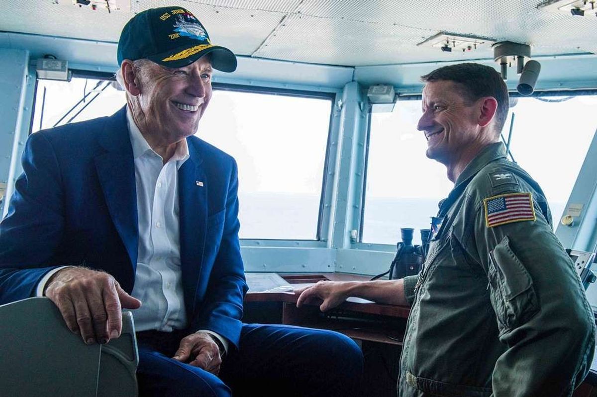 Vice-president-joe-biden-meets-with-capt-greg-huffman-uss-john-c-stennis-cvn-513366