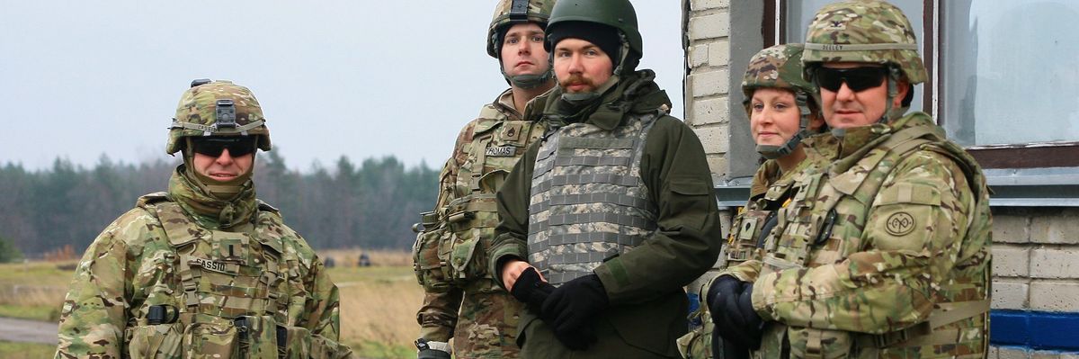 Bi-partisan coalition urges Biden to resist calls for military action against Russia